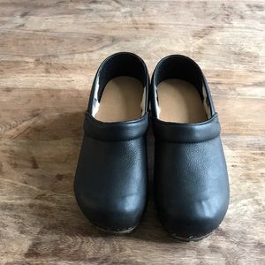 Black shearling sanita clogs